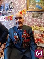 Ершовский 98-летний ветеран поднимает пудовую гирю